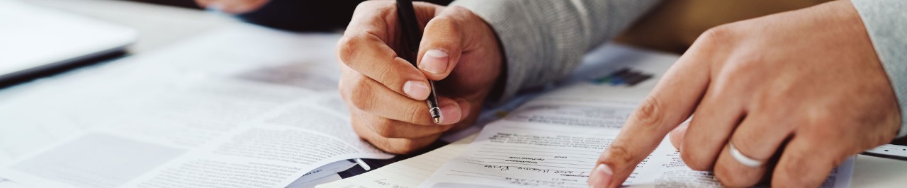 Man writing on a notebook